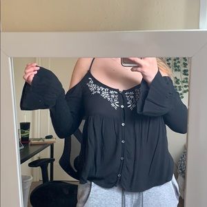 Black flowy partially off the shoulder top